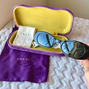 Gucci black oval sunglasses